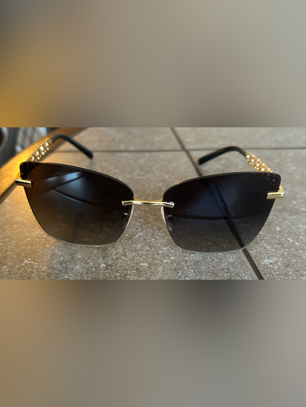 Dolce & Gabbana Black Gradient Rimless Sunglasses with Gold Chain Temples